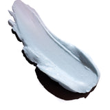 Smooth light blue Peppermint Invigorating Foot Cream 100 ML swatched on white background to showcase texture.