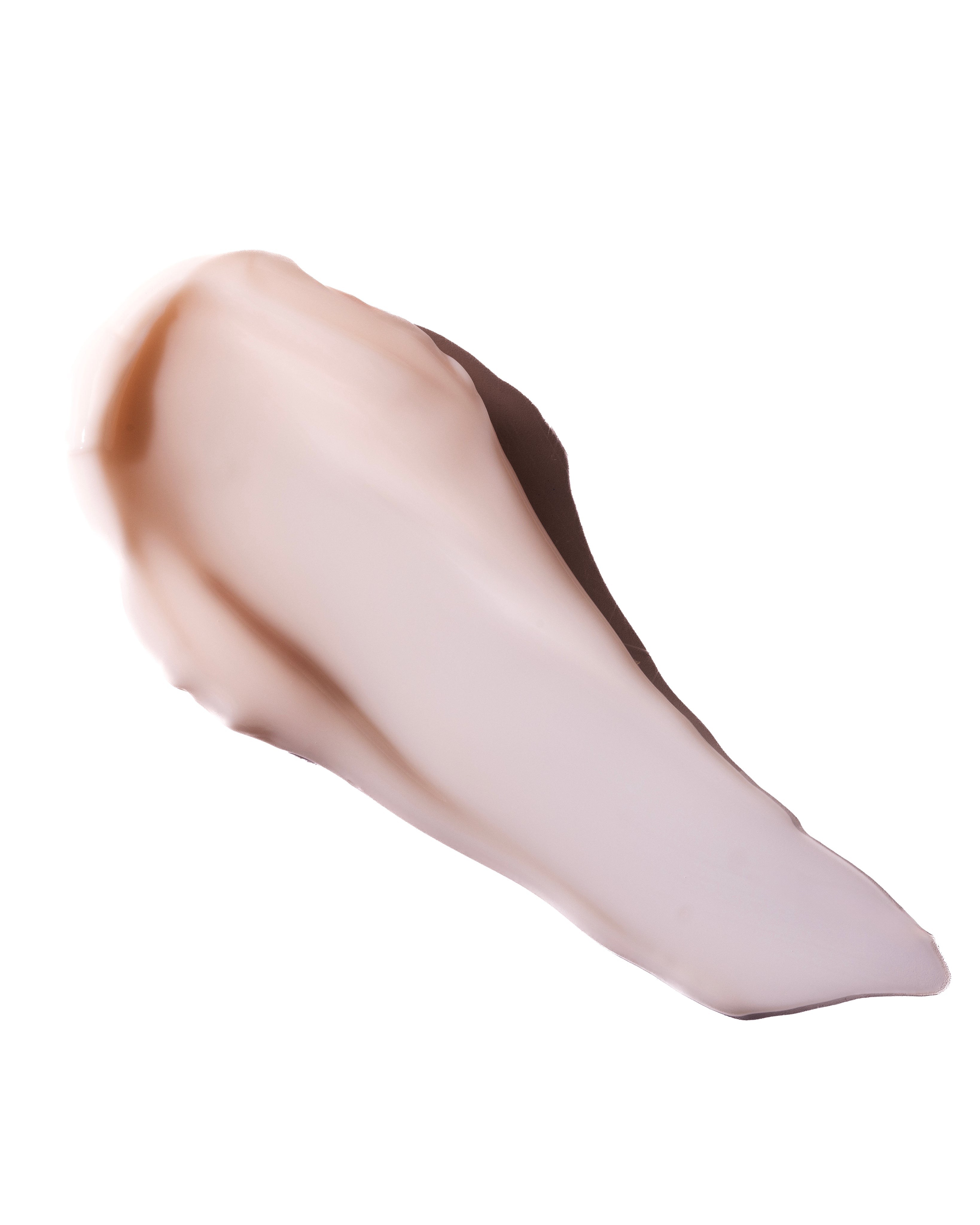 Smooth creamy substance against clean white background