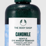Close-up of The Body Shop Camomile Gentle Eye Makeup Remover 250 ML with condensation on a green bottle