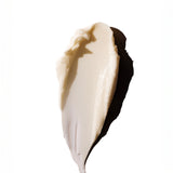 Close-up of creamy Coconut Hand Balm 30 ML swatched against a clean white background.