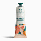 The Body Shop Hand Cream Crème Mains Pink Grapefruit 30ml on clean background highlighting vibrant packaging