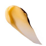 Smooth swirl of mango body yogurt 200ml against plain backdrop showcasing creamy texture.