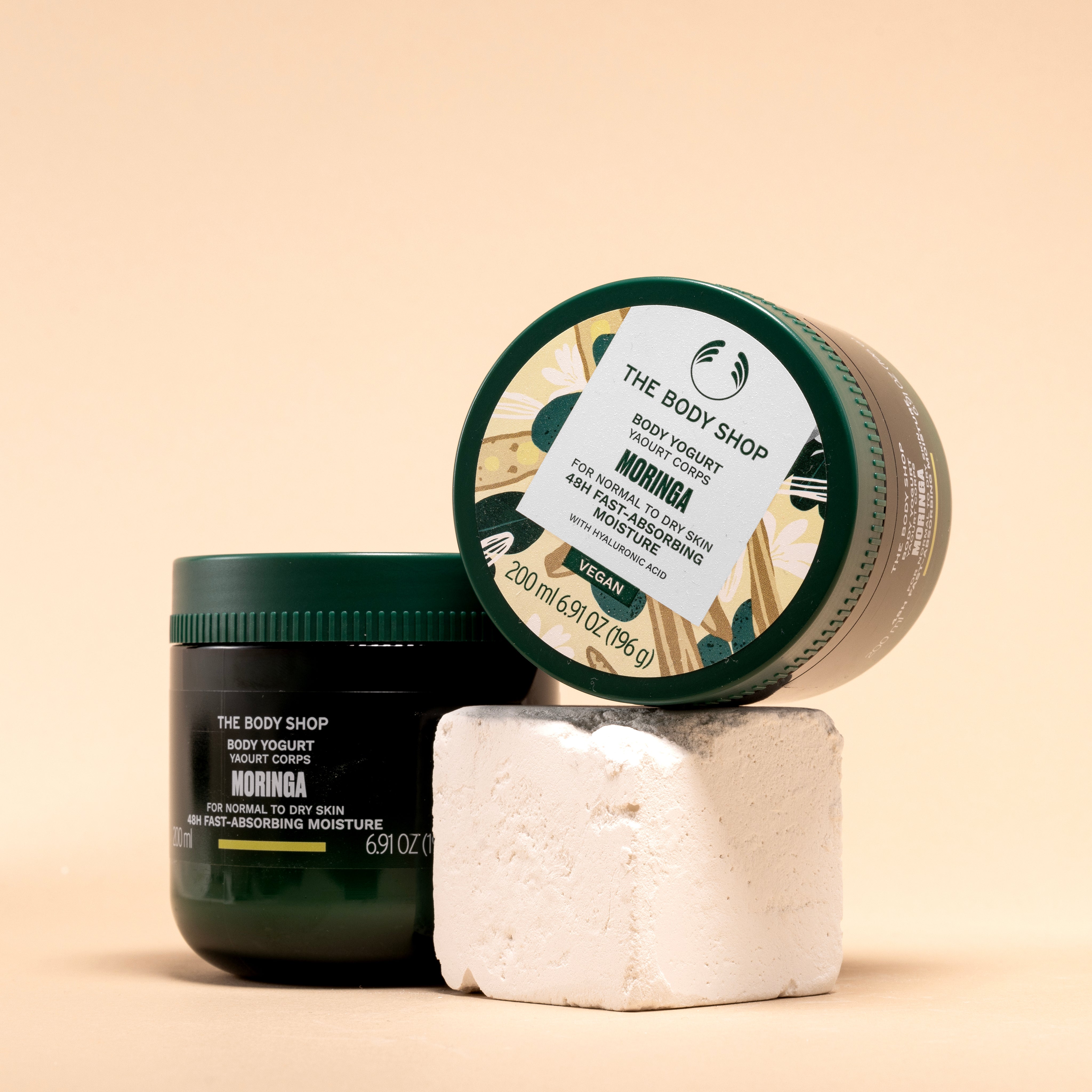The Body Shop Moringa Body Yogurt 200 ML displayed in appealing arrangement with a clean, soft background.