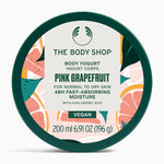 Vibrant container of The Body Shop Pink Grapefruit Body Yogurt 200 ML on clean surface, designed for normal to dry skin.