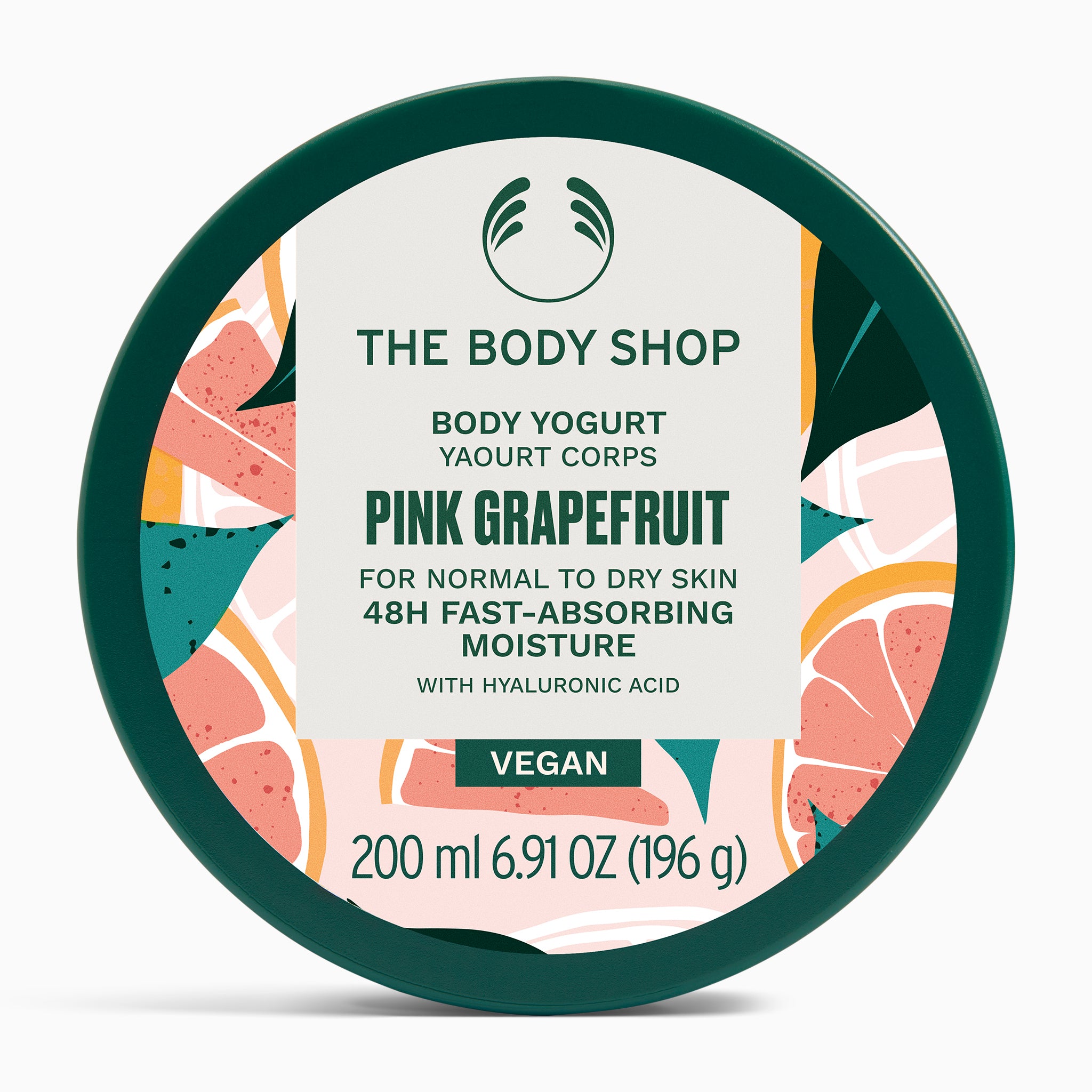 Vibrant container of The Body Shop Pink Grapefruit Body Yogurt 200 ML on clean surface, designed for normal to dry skin.
