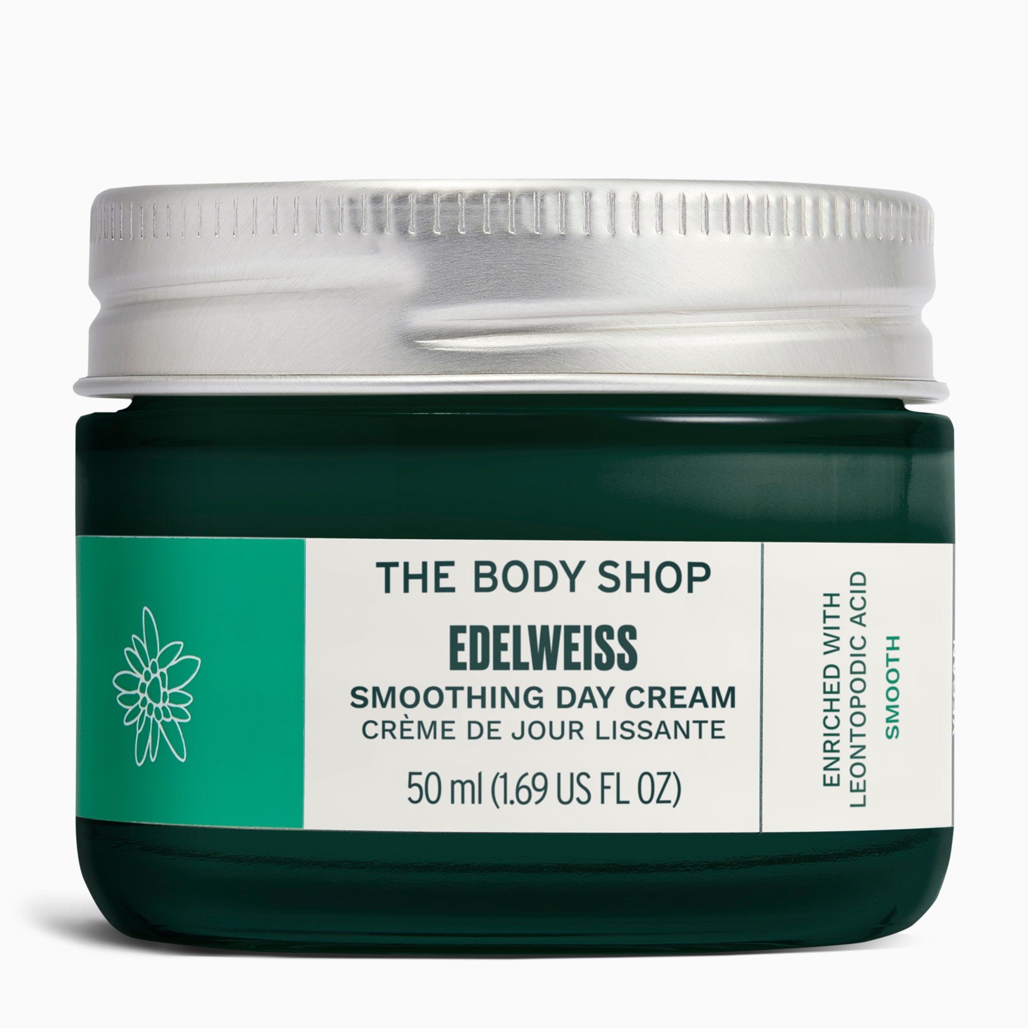 Edelweiss Smoothing Day Cream 50 ML in dark green jar on a sleek surface, designed for elegant presentation.