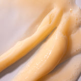 Close-up of Shea Intense Repair Shampoo 250 ML showing creamy texture and bubbles against a clean white background.