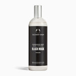 Sleek bottle of The Body Shop Black Musk Fragrance Mist 100 ML on clean background