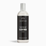 Sleek bottle of The Body Shop Black Musk Fragrance Mist 100 ML on clean background