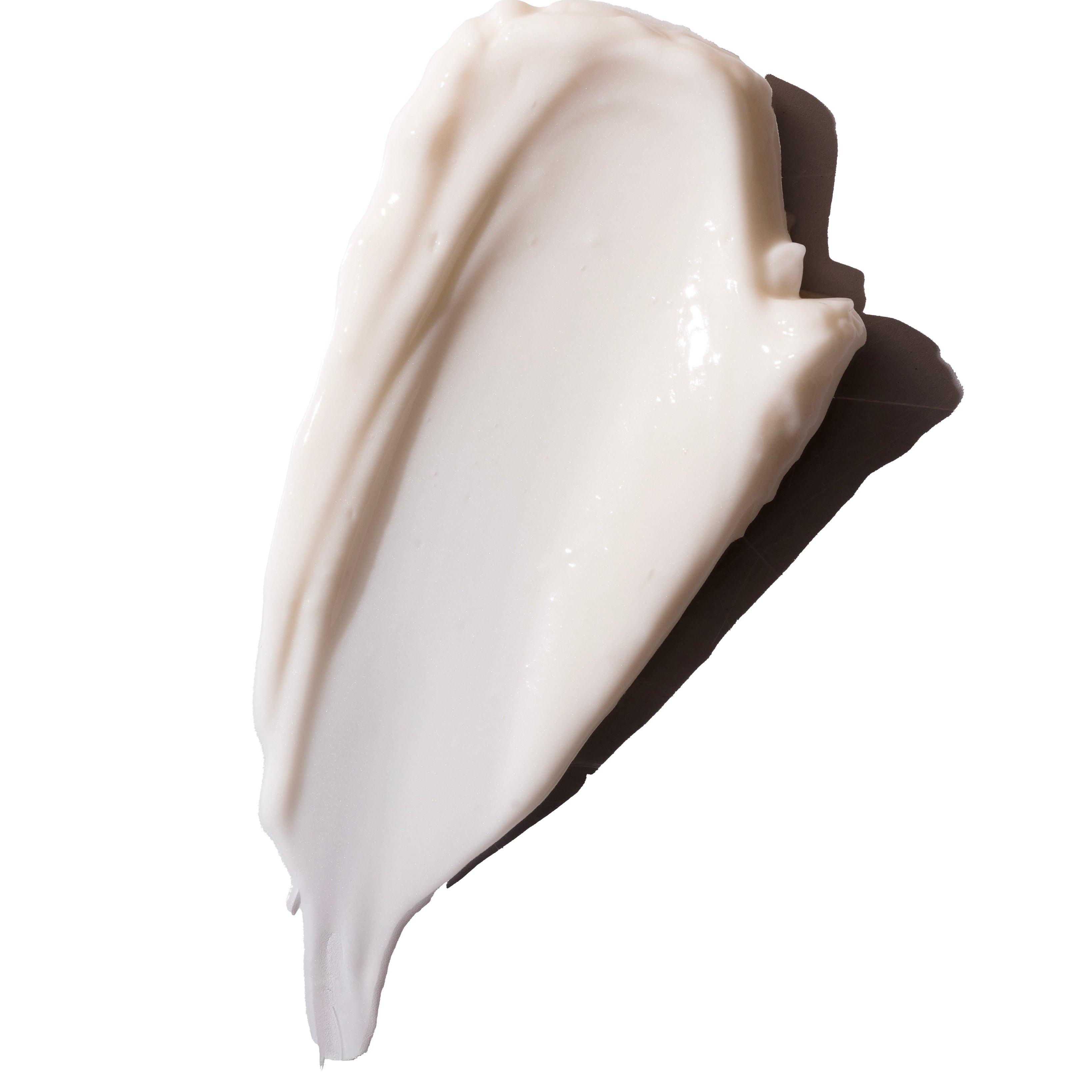 Smooth, creamy texture of a skincare product on a clean white background