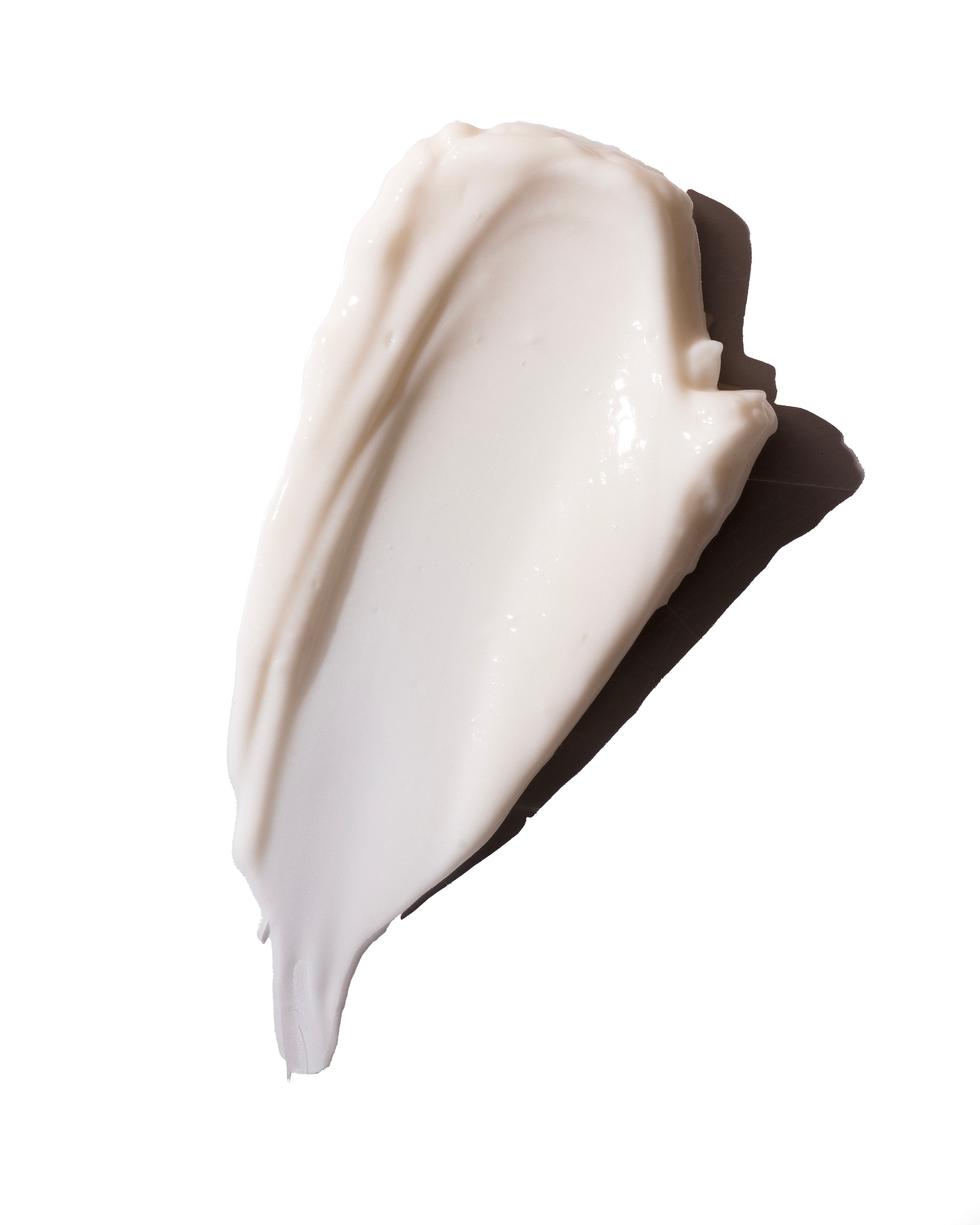 Smooth, creamy texture of a skincare product on a clean white background