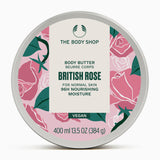 A circular tin of The Body Shop British Rose Body Butter 400ml on soft background
