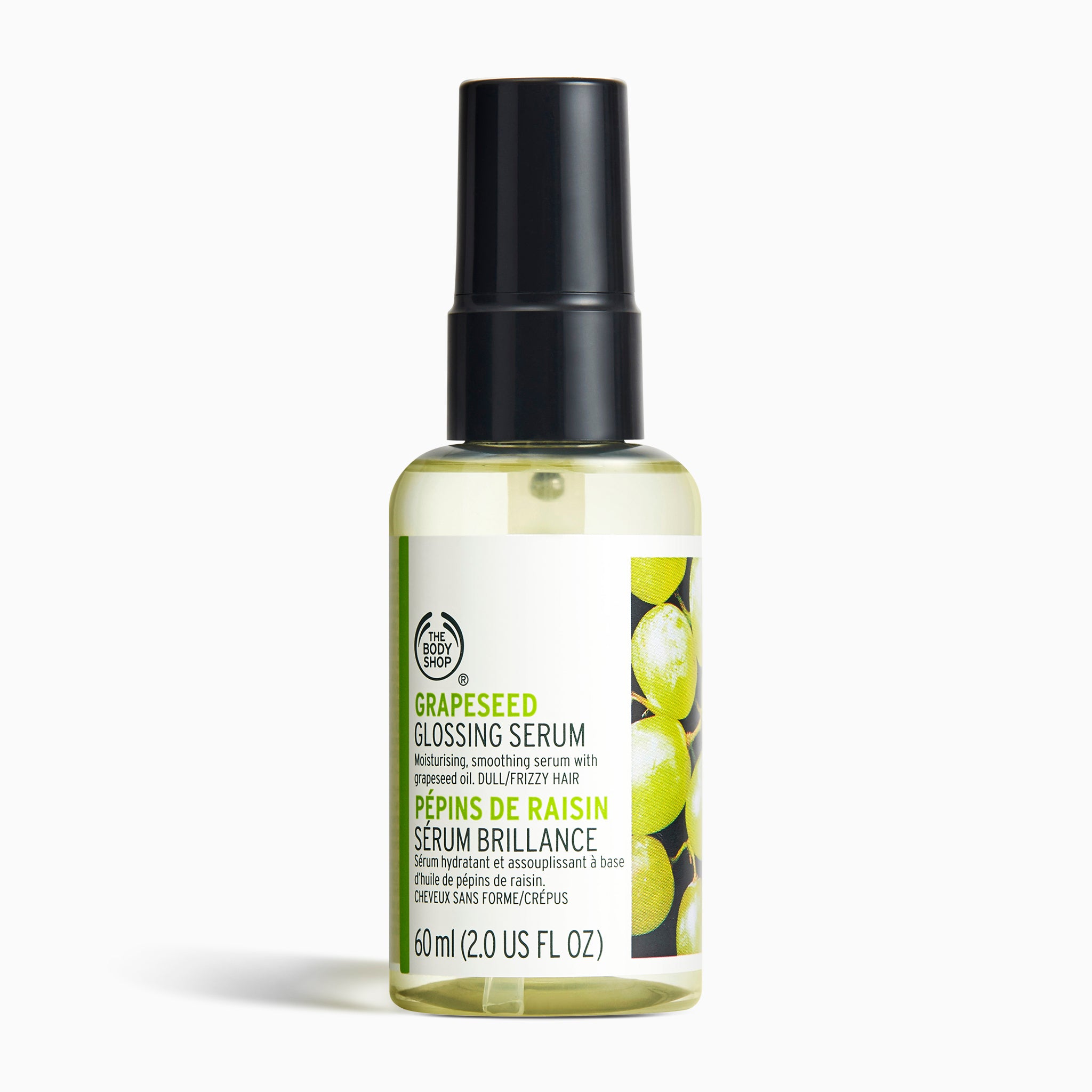 The Body Shop Grapeseed Glossing Serum 60ml on a clean surface, designed to smooth dull frizzy hair.