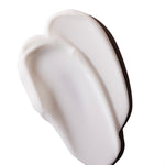 Creamy texture of Vitamin E Cream Cleanser 250 ML on clean white background