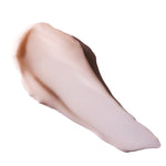 Smooth creamy substance against clean white background