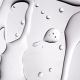 Close-up image showcasing smooth gel texture with droplets, reflecting light on studio backdrop