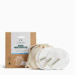 Reusable makeup remover pads from The Body Shop, displayed with their packaging and a carrying bag.