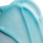 Close-up of Guarana And Coffee Energising Moisturiser For Men 100 ML showcasing its smooth blue cream texture