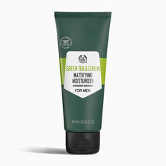 Green Tea & Lemon Mattifying Moisturiser 100 ML on plain background, showcasing vibrant green and white packaging.