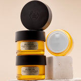 The Body Shop 'Oils of Life' skincare products on a neutral background