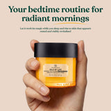 Oils of Life Sleeping Cream Product in Use with Model